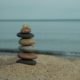 Supervisory Training using a stone cairn which symbolizes her experience and desire to help build well-functioning workplaces